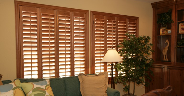 Hardwood shutters in Miami living room.